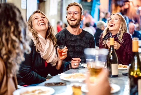 Restaurant patio with guests enjoying insect-free outdoor dining
